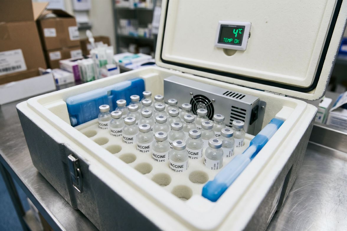 Vaccines being transported in a cold storage container